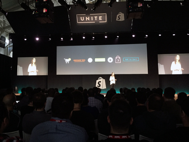 Speaker on stage at Shopify Unite
