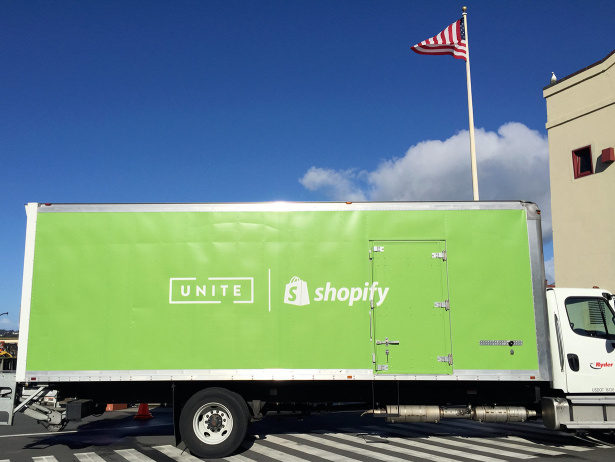 Shopify branded van parked outside the Unite conference
