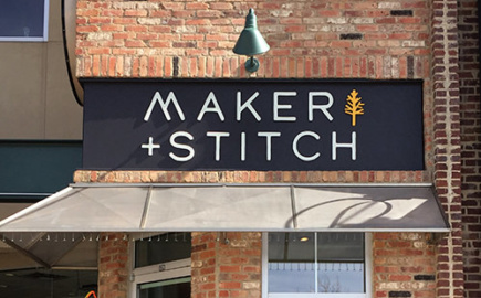 Maker + Stitch brick and mortar store signage for a yarn shop
