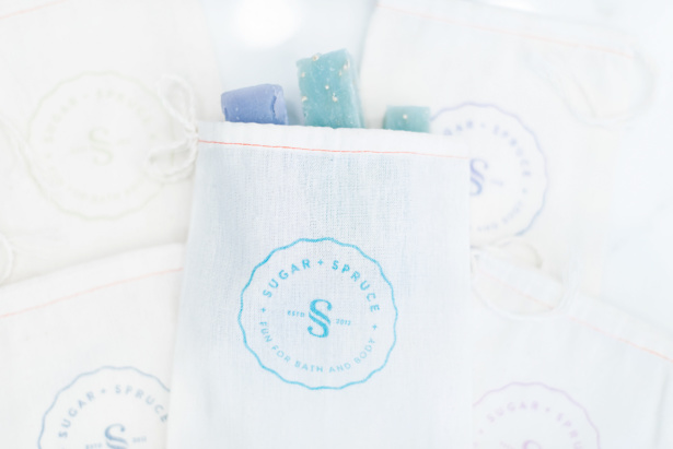 The Sugar + Spruce seal on muslin bags