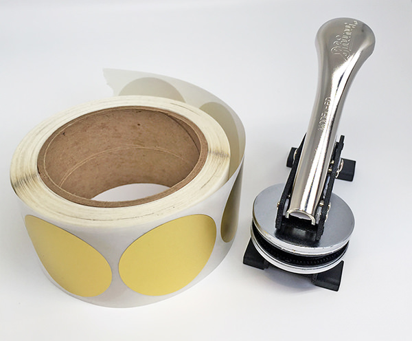 My trusty embosser and roll of matte gold stickers