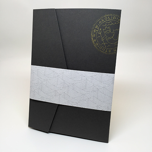 Pocket folder with die cut gold foil print