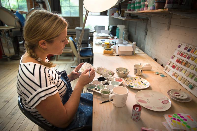 Molly-Hatch-ceramic-artist-working-in-studio
