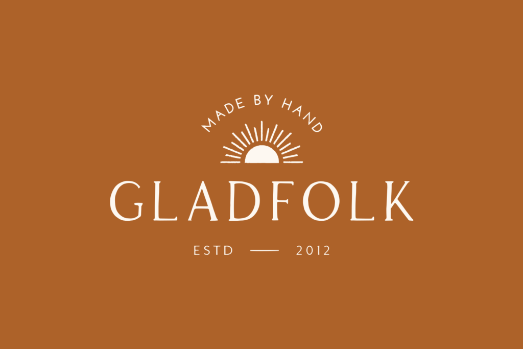 Brown Gladfolk logo design with sun icon and “made by hand” tagline.