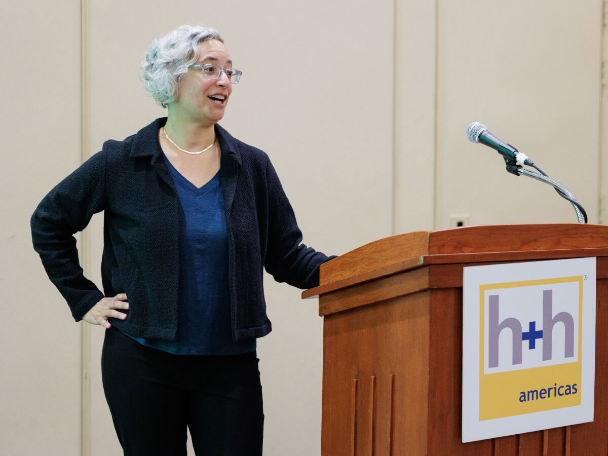 Arianne Foulks speaking at h+h americas in Chicago